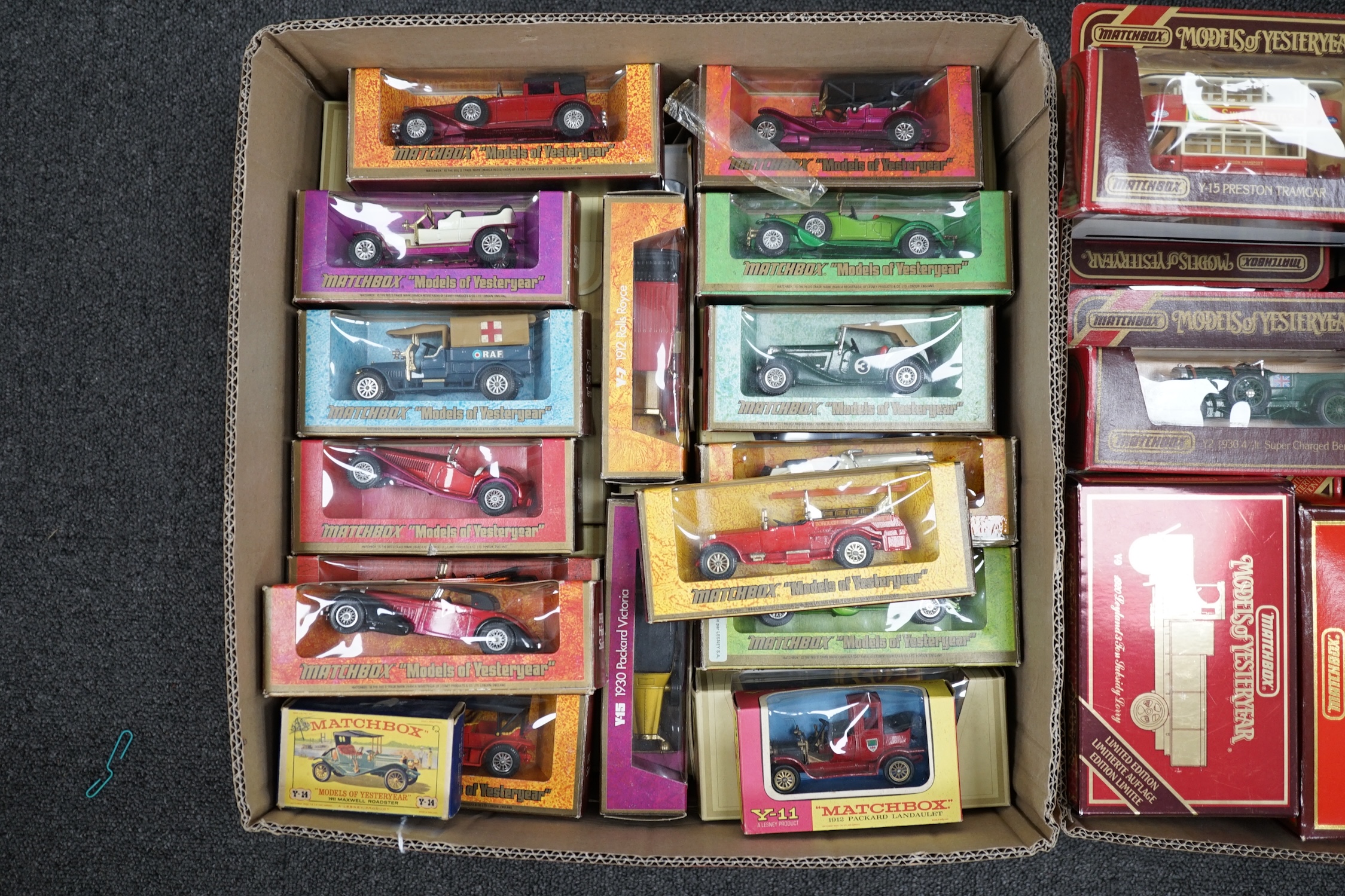 Seventy-nine Matchbox Models of Yesteryear in mainly woodgrain, cream and maroon era boxes, including cars and commercial vehicles